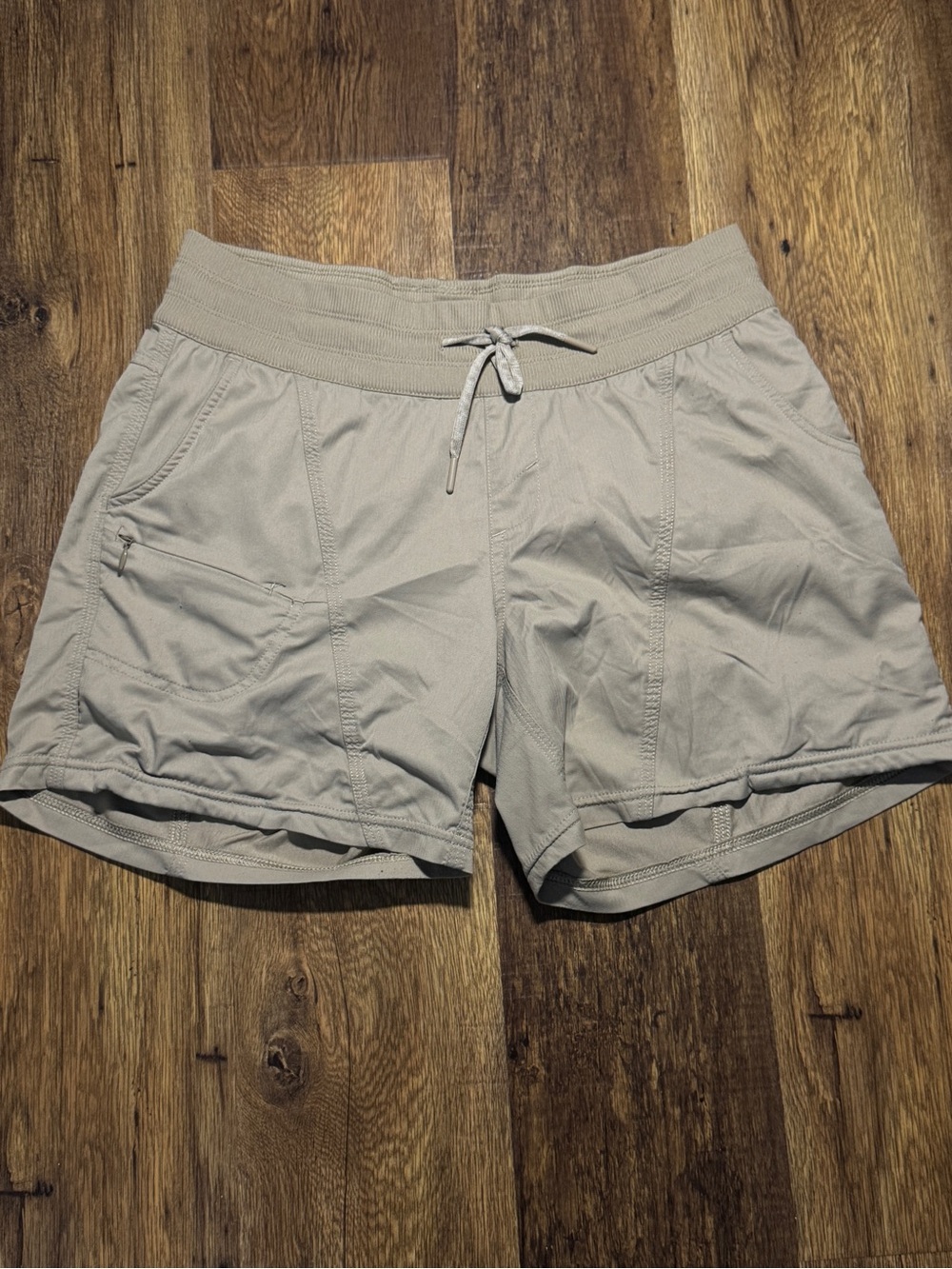 The North Face Women's Light Gray Athletic Shorts with Drawstring Waist